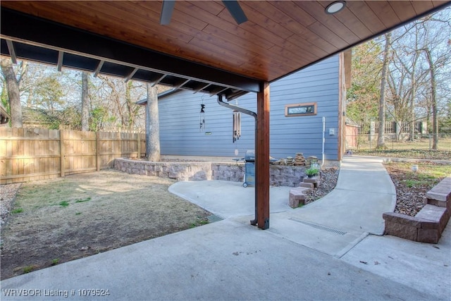 view of patio / terrace featuring fence