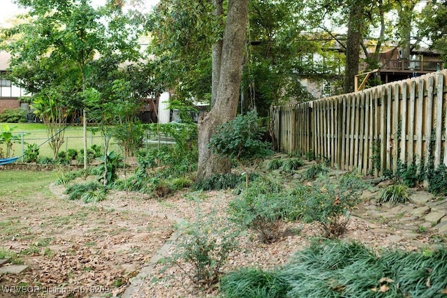 view of yard featuring fence