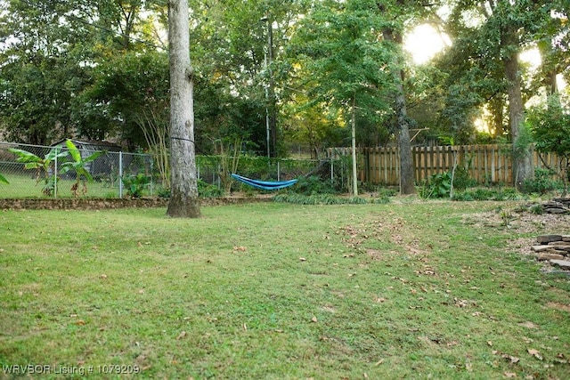 view of yard with fence