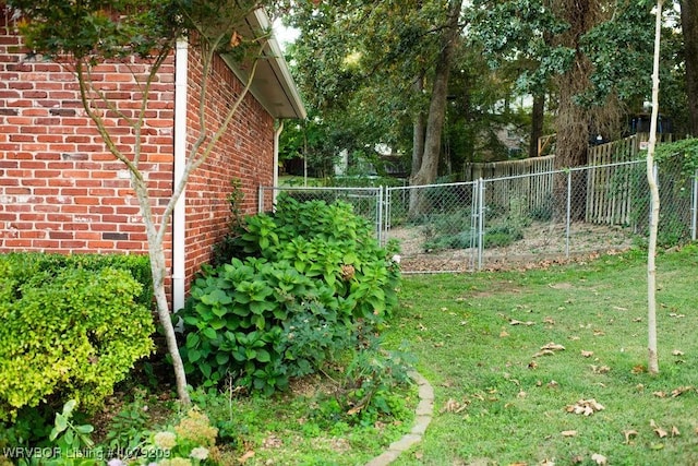 view of yard with fence