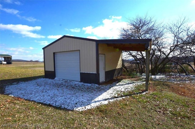 view of outbuilding with a garage