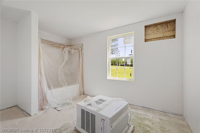 bathroom featuring an AC wall unit