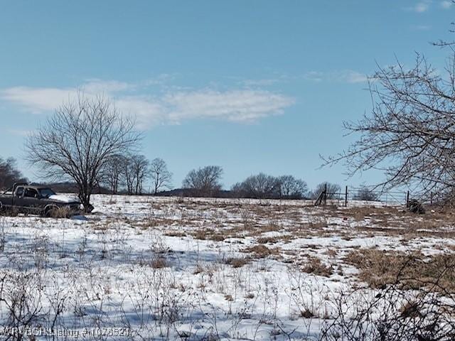 view of snow covered land