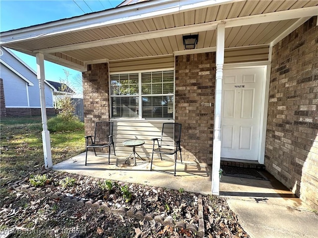 entrance to property with covered porch