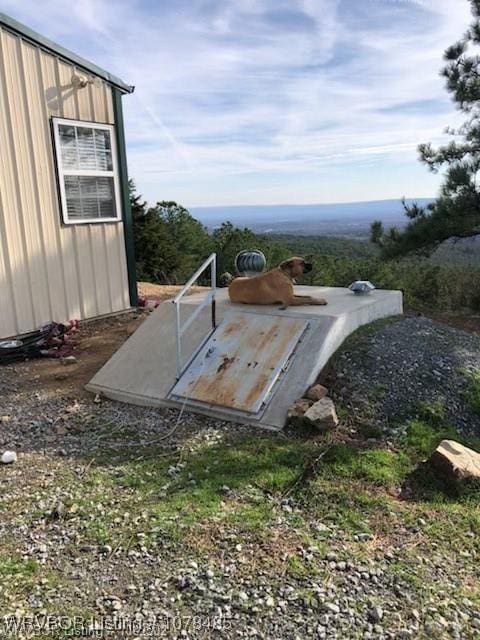 view of entry to storm shelter