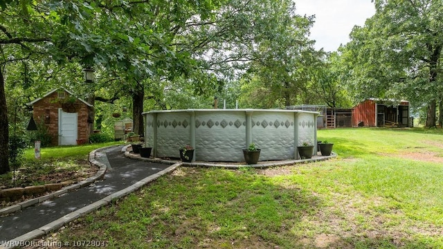 view of outdoor structure with a lawn