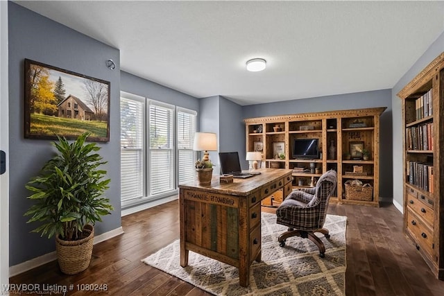 office area featuring hardwood / wood-style flooring and baseboards