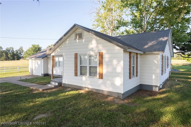 106595 S 4770th Rd, Muldrow, OK 74948 - view of home's exterior featuring a metal roof and an attached garage