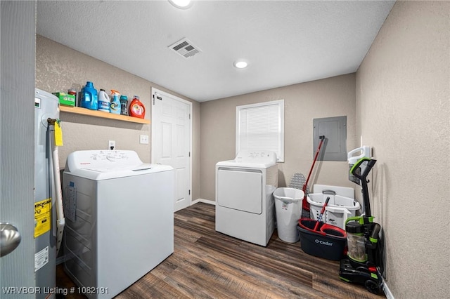 106595 S 4770th Rd, Muldrow, OK 74948 - laundry area featuring washer and dryer, electric panel, dark wood-style flooring, a textured wall, and electric water heater