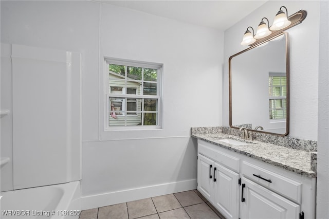 618 Sycamore St, Van Buren, AR 72956 - full bathroom featuring tile patterned floors, vanity, baseboards, and shower / washtub combination