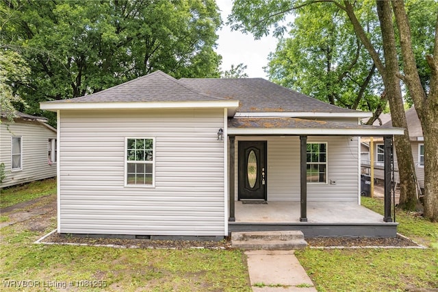 618 Sycamore St, Van Buren, AR 72956 - view of front of property featuring a porch, a shingled roof, a front lawn, and crawl space
