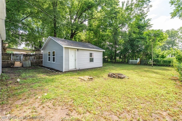 618 Sycamore St, Van Buren, AR 72956 - view of yard featuring an outdoor fire pit, an outbuilding, and view of scattered trees