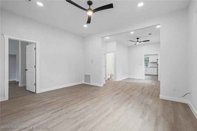 618 Sycamore St, Van Buren, AR 72956 - empty room with ceiling fan, light wood finished floors, recessed lighting, and baseboards