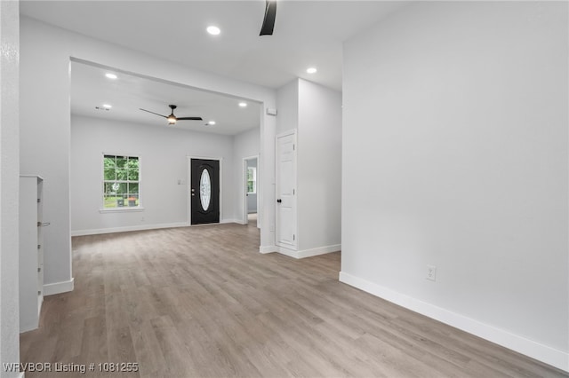 618 Sycamore St, Van Buren, AR 72956 - unfurnished living room with a ceiling fan, recessed lighting, wood finished floors, and baseboards