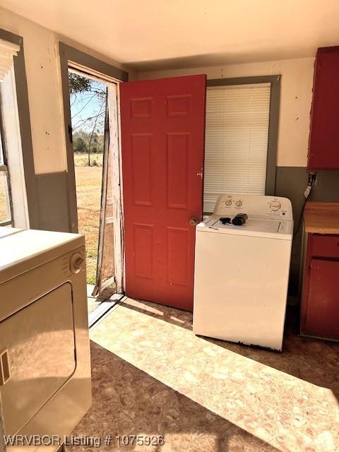 washroom featuring washer / clothes dryer