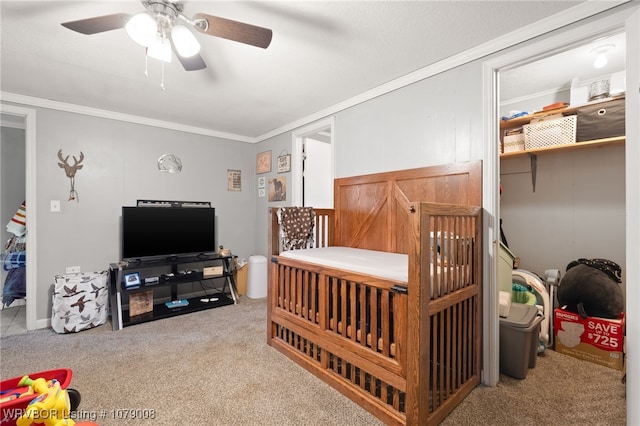 bedroom with light carpet, crown molding, and ceiling fan