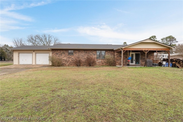 ranch-style home with a garage and a front yard