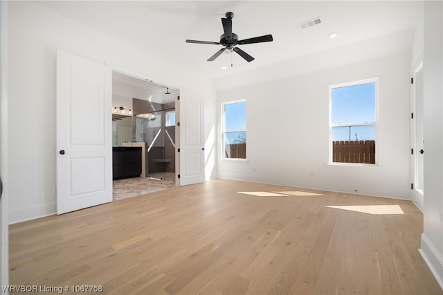 interior space featuring ceiling fan and light wood-type flooring