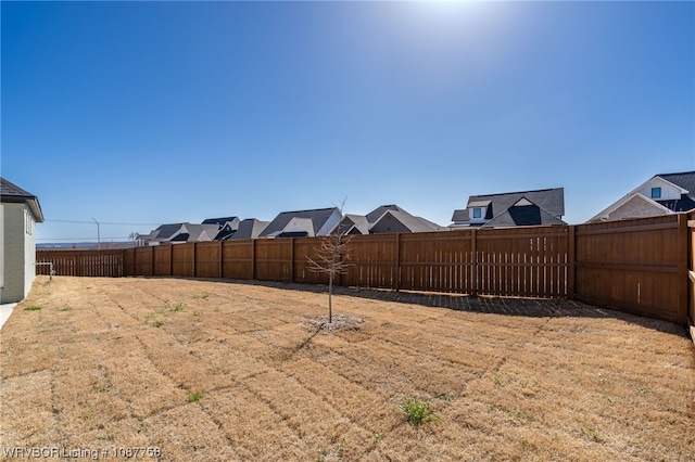 7631 Woodbine Ln, Fort Smith, AR 72916 - fenced backyard featuring a residential view