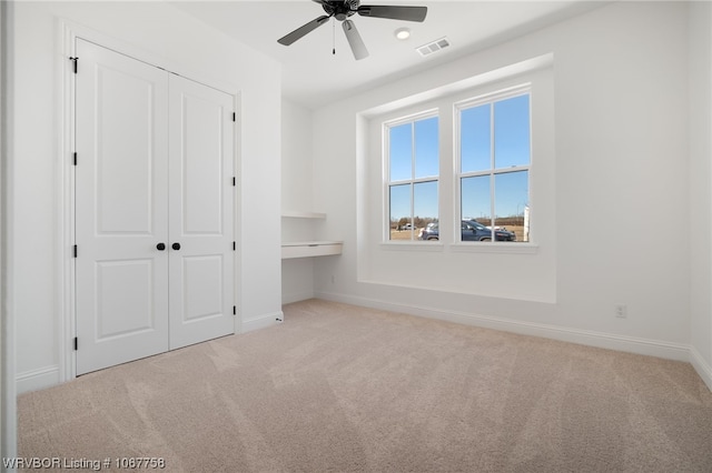 7631 Woodbine Ln, Fort Smith, AR 72916 - unfurnished bedroom featuring carpet flooring, a closet, and a ceiling fan