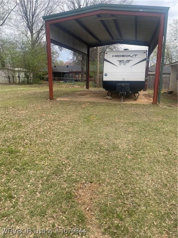 606 Highland Dr, Charleston, AR 72933 - view of yard featuring a detached carport