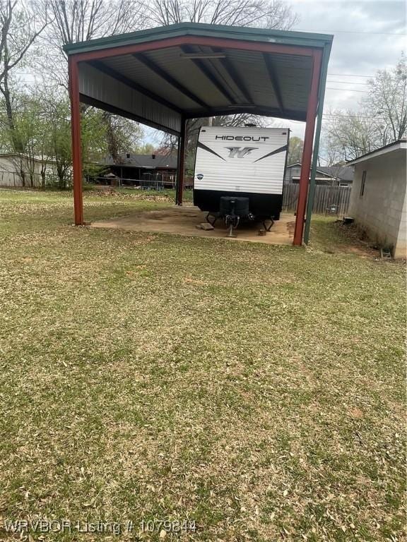 606 Highland Dr, Charleston, AR 72933 - view of yard with a detached carport and fence