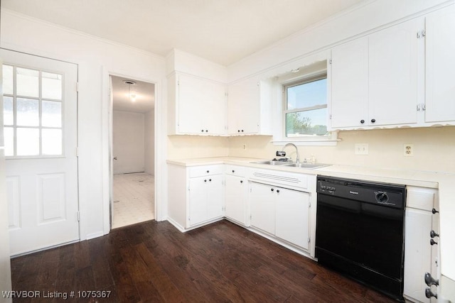 kitchen with white cabinets, ornamental molding, dark wood-type flooring, sink, and dishwasher