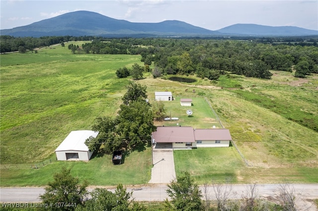 drone / aerial view with a mountain view and a rural view