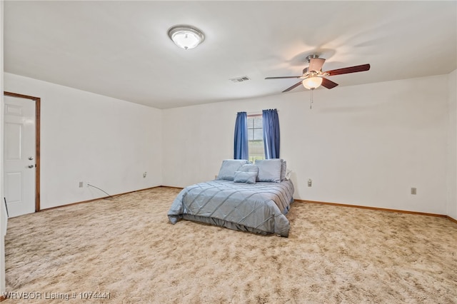 carpeted bedroom featuring ceiling fan