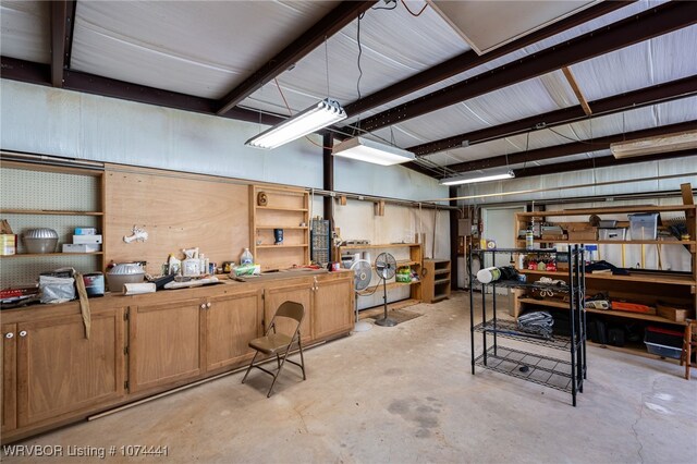 basement with a workshop area and independent washer and dryer