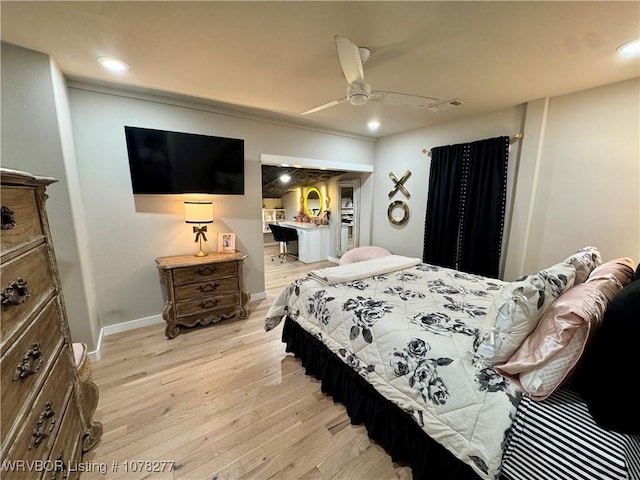 bedroom with light wood-type flooring and ceiling fan