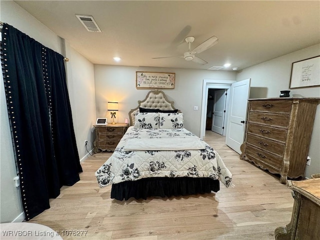 bedroom featuring ceiling fan and light wood-type flooring