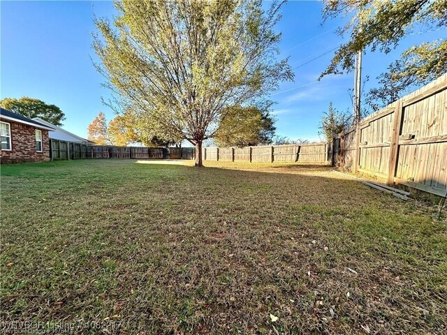 106 E Dora Ln, Poteau, OK 74953 - view of fenced backyard