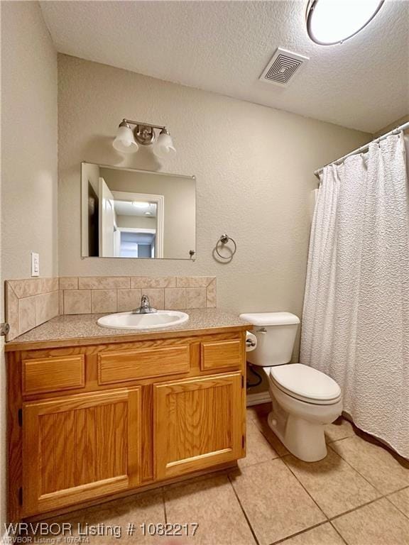 106 E Dora Ln, Poteau, OK 74953 - bathroom featuring vanity, a textured ceiling, tile patterned floors, a textured wall, and a shower with curtain