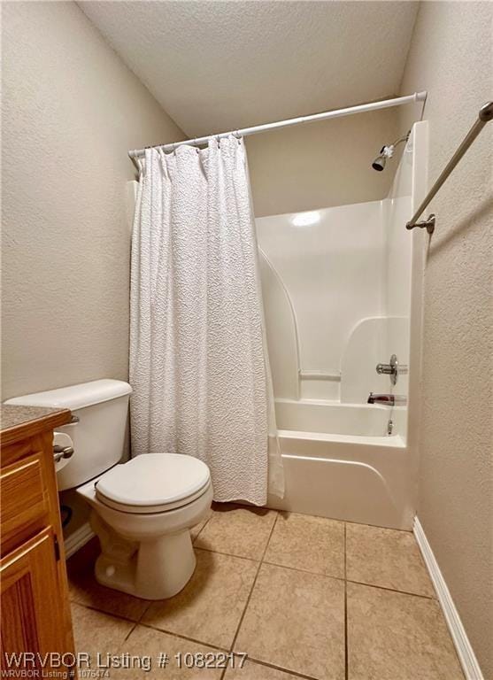 106 E Dora Ln, Poteau, OK 74953 - full bathroom with shower / bath combo with shower curtain, a textured wall, vanity, tile patterned flooring, and a textured ceiling