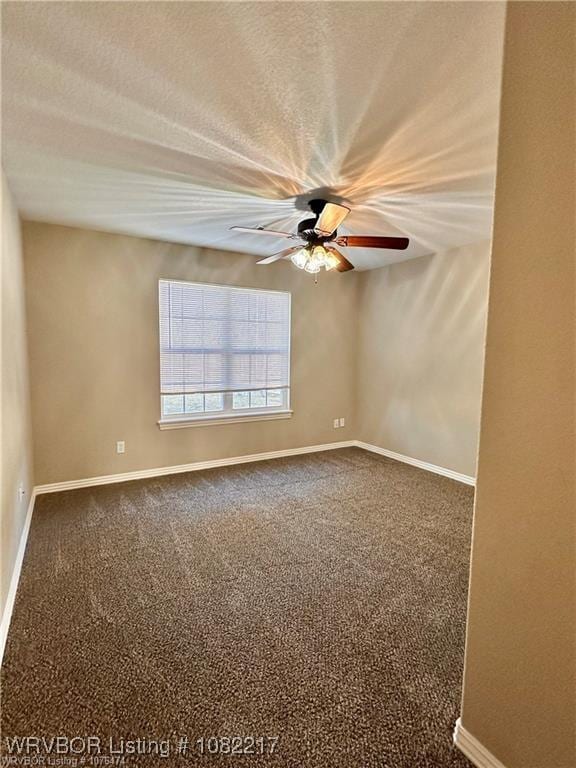 106 E Dora Ln, Poteau, OK 74953 - carpeted spare room featuring ceiling fan and a textured ceiling