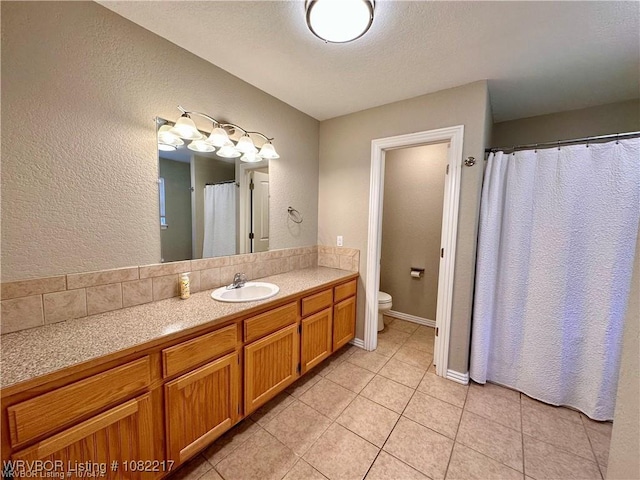 106 E Dora Ln, Poteau, OK 74953 - bathroom featuring vanity, a textured wall, tile patterned flooring, and a shower with shower curtain