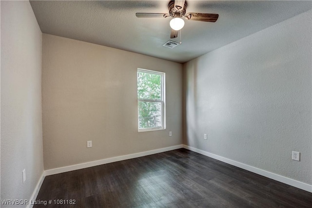 3614 Blair Ave, Fort Smith, AR 70903 - spare room with dark wood-style floors, ceiling fan, and baseboards