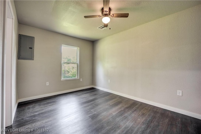 3614 Blair Ave, Fort Smith, AR 70903 - empty room featuring electric panel, dark wood finished floors, ceiling fan, and baseboards