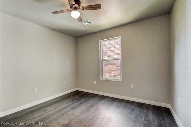 3614 Blair Ave, Fort Smith, AR 70903 - empty room with dark wood finished floors, baseboards, and ceiling fan