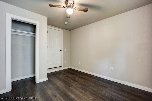 3614 Blair Ave, Fort Smith, AR 70903 - unfurnished bedroom with dark wood-style floors, baseboards, a ceiling fan, and a closet