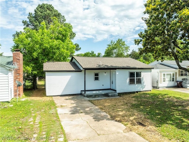 3614 Blair Ave, Fort Smith, AR 70903 - ranch-style home featuring concrete driveway, a front lawn, and roof with shingles