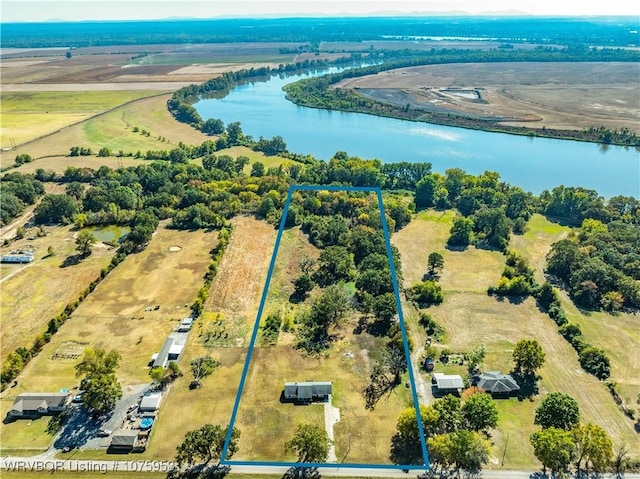 aerial view with a water view and a rural view