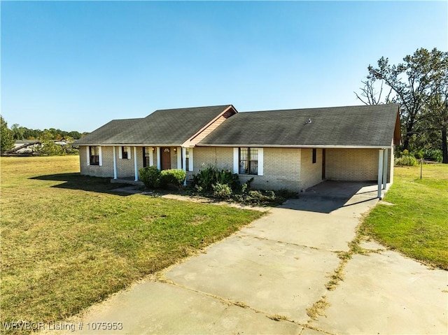 ranch-style house with a carport and a front lawn