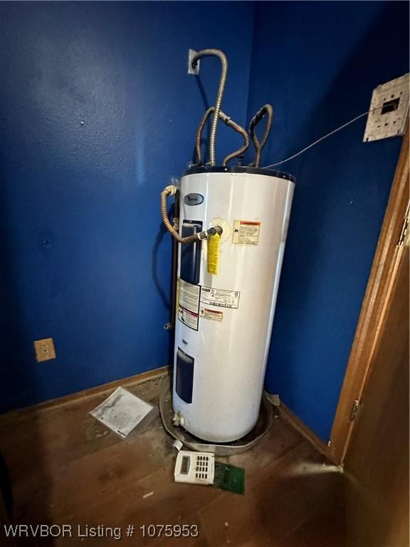 utility room with water heater