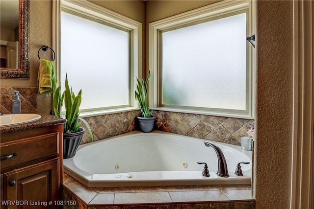 2304 Durango Dr, Van Buren, AR 72956 - bathroom with vanity and a tub with jets