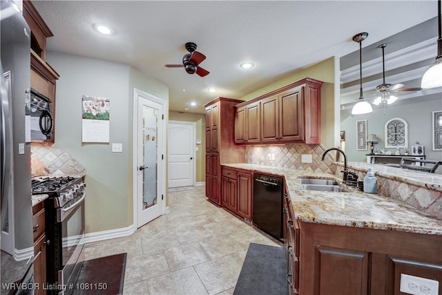 2304 Durango Dr, Van Buren, AR 72956 - kitchen with ceiling fan, black appliances, a sink, backsplash, and light stone counters