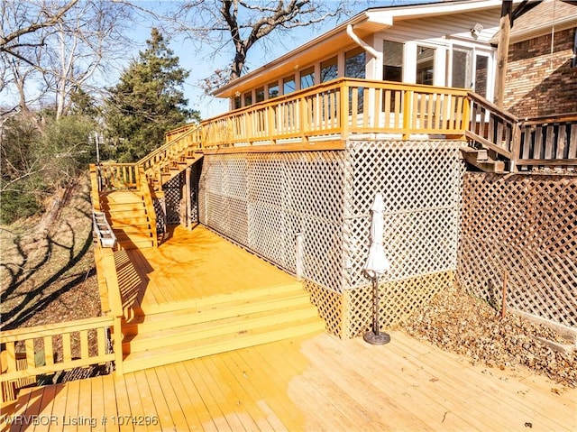 wooden terrace with a sunroom