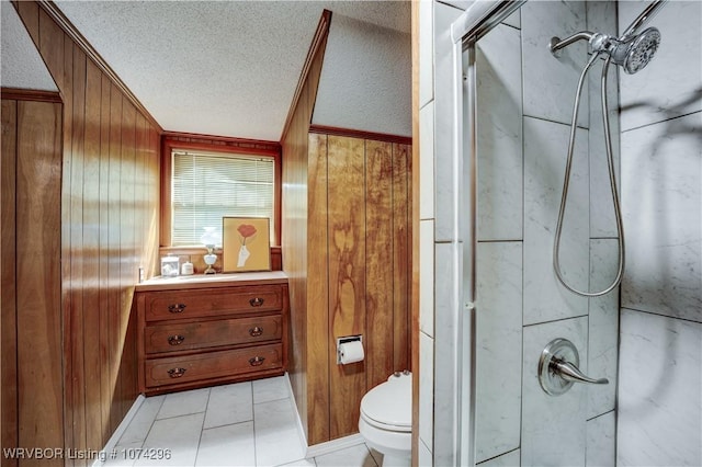 bathroom with a textured ceiling, walk in shower, crown molding, and wood walls