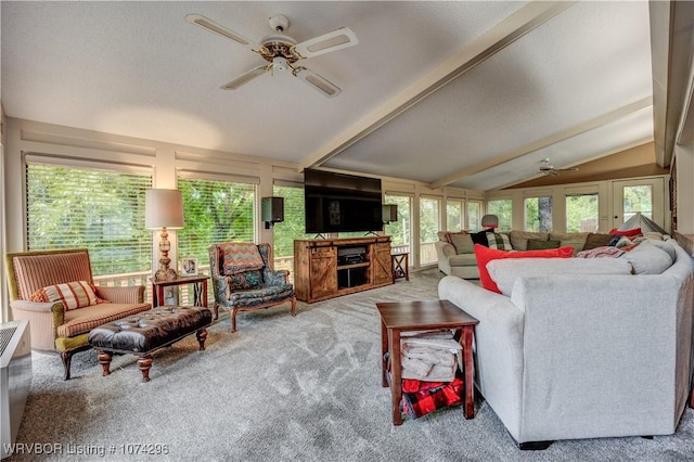 living room with carpet flooring, ceiling fan, and lofted ceiling with beams